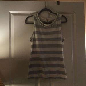 Sleeveless gray and white shirt